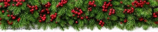 Fototapeta Christmas garland of evergreen boughs with red berries