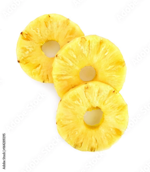 Obraz A cut slice of pineapple fruit isolated on white background