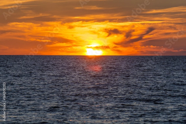 Obraz Sunset over water