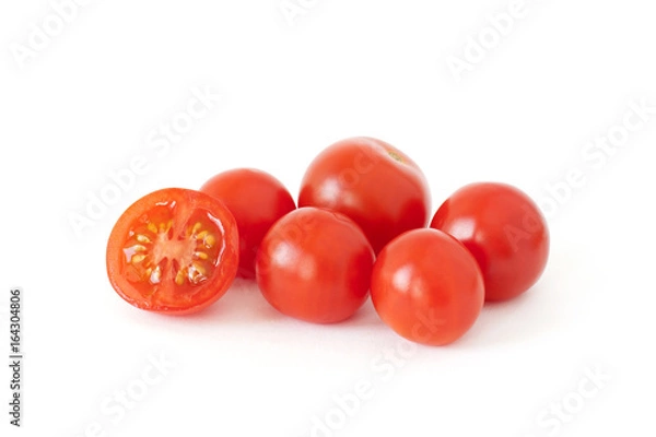 Obraz Some fresh cherry tomatoes isolated on white background