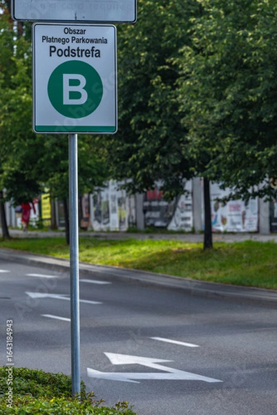 Fototapeta Expanded parking zone, Zone B, Zone A, solar-powered parking meter