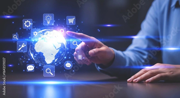 Fototapeta Person interacting with a digital globe surrounded by icons in a futuristic interface setting