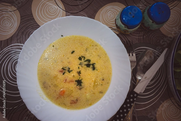 Obraz Delicious homemade soup in a plate at home