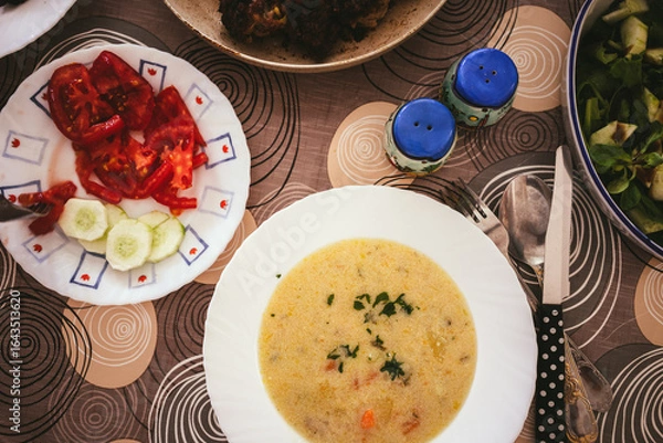 Obraz Delicious homemade soup in a plate at home