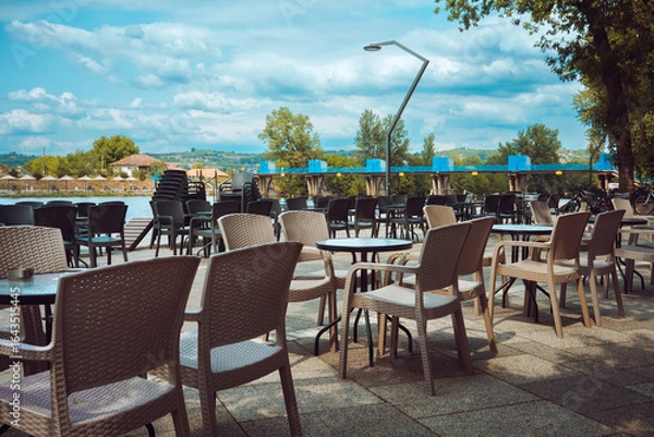 Obraz Empty tables in the restaurant garden