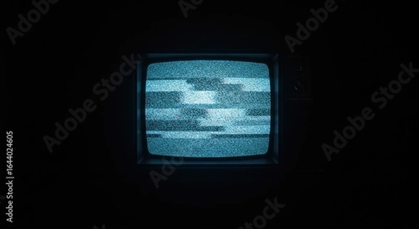 Fototapeta Vintage Television Glowing with Hypnotic Blue Static in Pitch Darkness