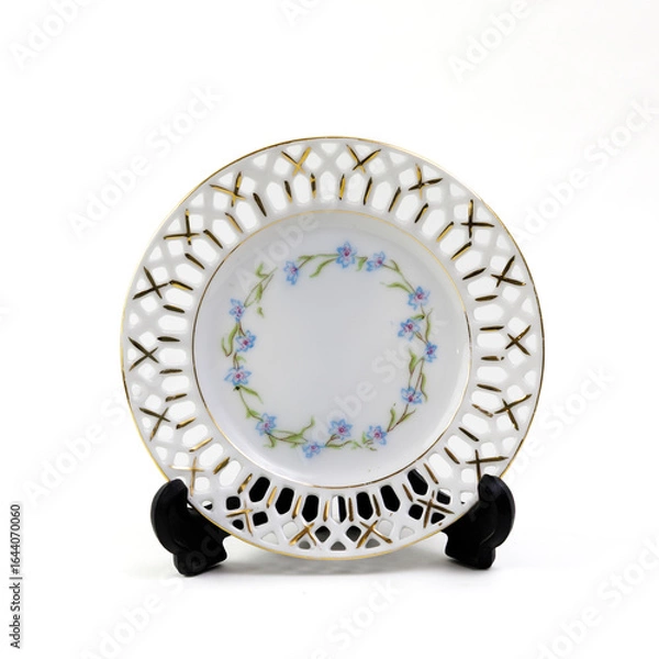 Obraz Decorative Plates On White Background
