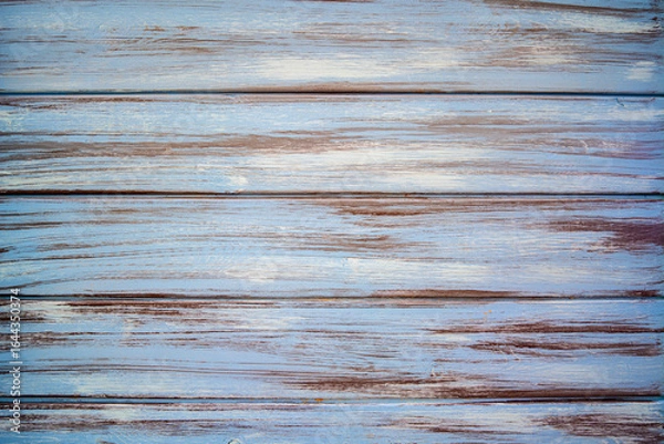 Fototapeta Bright rustic blue wooden planks background with peeling paint and vintage texture, perfect for food photography, product display, banner design, website backdrop, and creative advertising projects