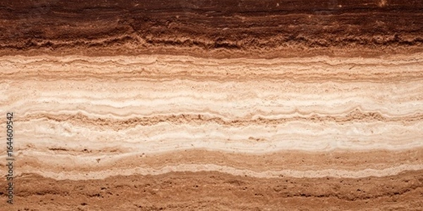 Fototapeta Horizontal layers of varying shades of brown and beige, resembling geological strata