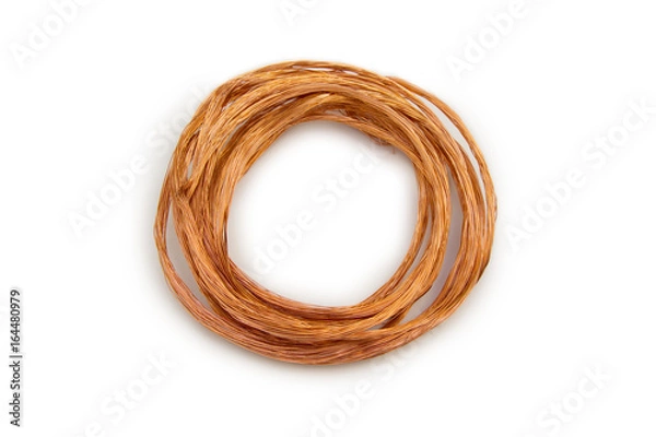 Fototapeta Cooper wire , twisted ring on the white background.