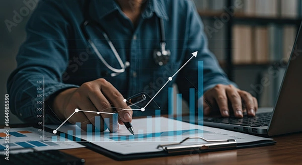 Obraz businessman drawing a graph