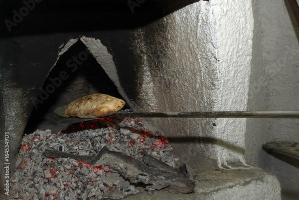 Fototapeta making of Artistic traditional breads from Sardinia. Olmedo. Sassari, Sardinia. Italy