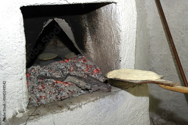 Fototapeta making of Artistic traditional breads from Sardinia. Olmedo. Sassari, Sardinia. Italy