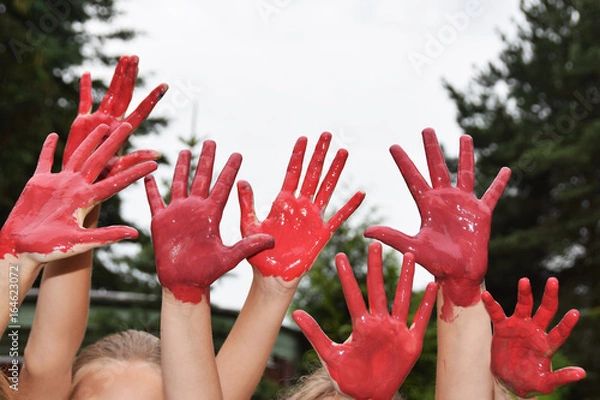 Obraz red hands of children playing staining