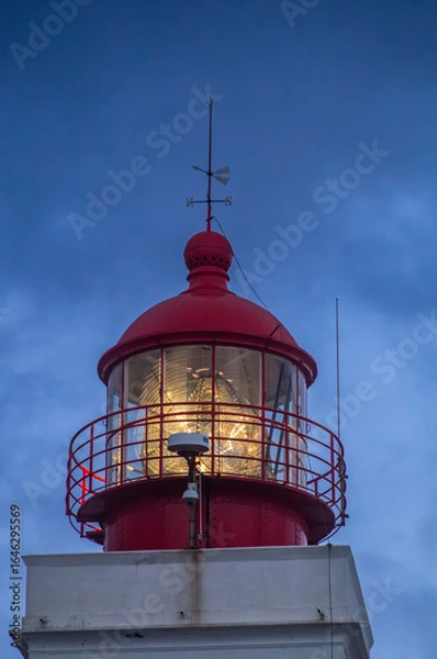 Fototapeta Illuminated lighthouse at dusk on Madeira Island at Ponta do Pargo
