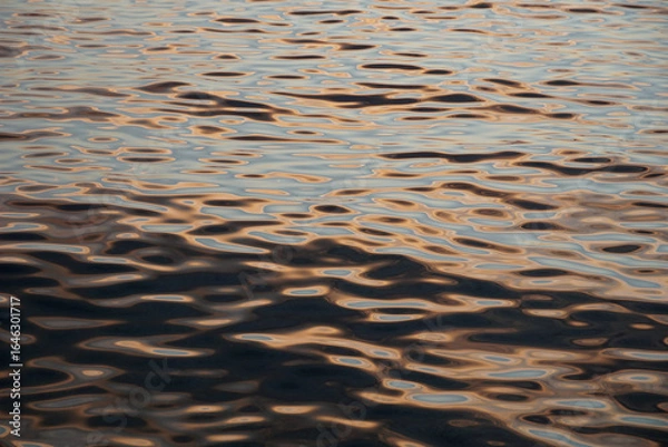 Fototapeta Horizontal position of irregular shapes on abstract background in gray and brown with gold reflections