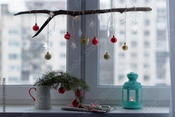 Fototapeta Christmas decorations on a window sill