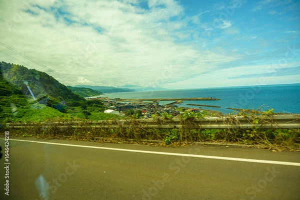 Obraz 海辺の町と夏の空