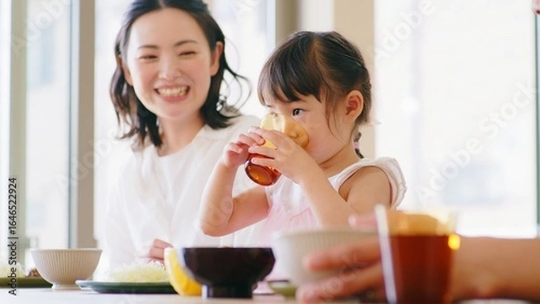 Fototapeta 3人家族の朝食シーン