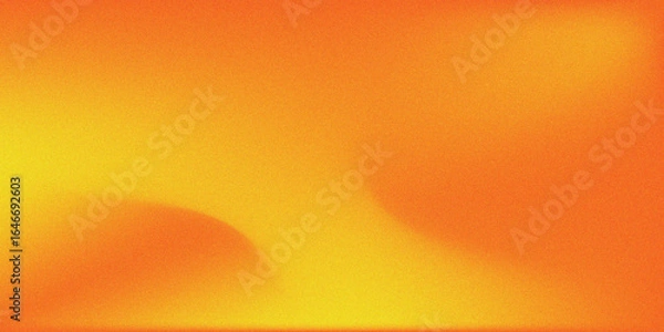 Fototapeta Orange and yellow glowing grainy gradient background with noise texture for poster, header, banner design with copy space and warm tones