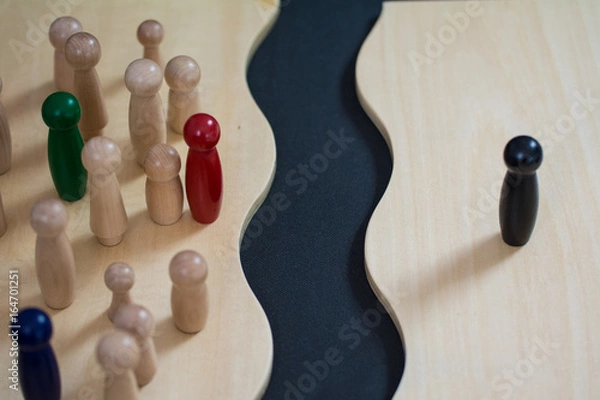 Fototapeta Mobbing, Konflikt, Integration, Team -dargestellt mit Spielfiguren