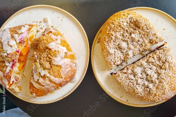 Fototapeta Delicious Assortment of Fruit-Filled Pastries with Icing and Crumb Topping