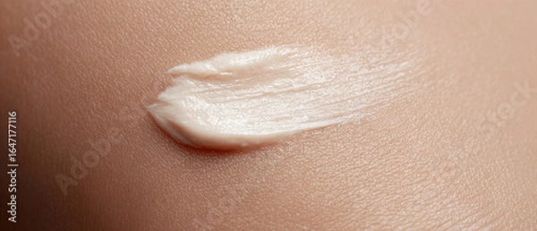 Obraz Close up of cream on skin, highlighting texture and smoothness