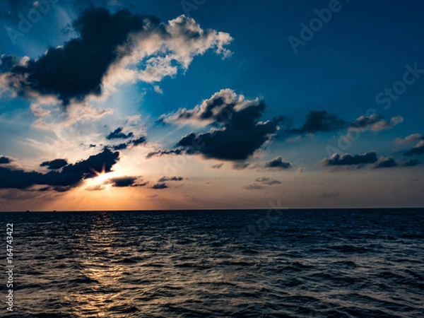 Fototapeta Sunrise sunset at sea