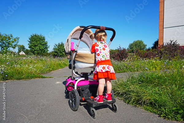 Fototapeta Universal baby stand for a second child, stand-on board for child carriages, designed to fit any stroller or pram.
