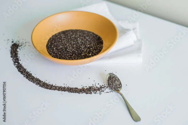 Obraz Healthy breakfast with yogurt, granola and chia seeds.