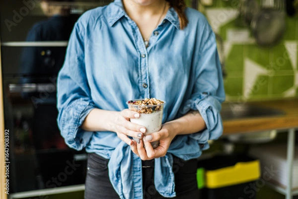 Obraz Healthy breakfast with yogurt, granola and chia seeds.