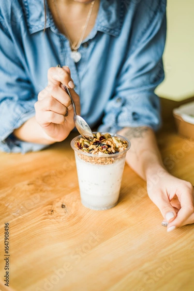 Obraz Healthy breakfast with yogurt, granola and chia seeds.