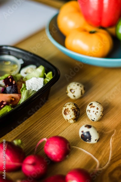 Obraz Fresh raw quail eggs on wooden table.