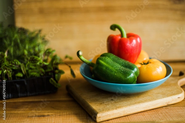 Obraz Healthy vegetable salad with tomatoes, peppers, cucumbers, onion and cheese.