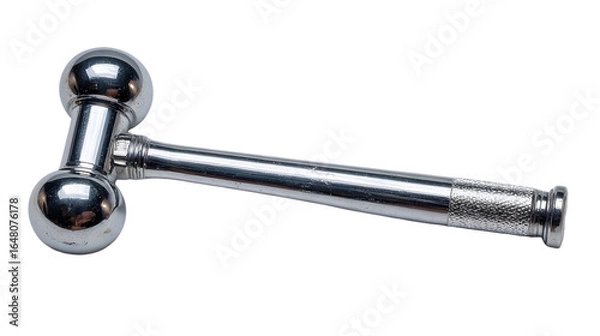 Fototapeta A shiny silver metal massage tool with spherical ends laying on a black background in a studio shot