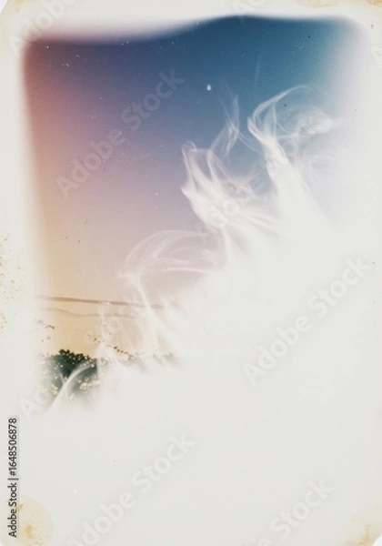 Fototapeta Dreamy coastal view with hazy cloudscape evoking serene atmosphere and tranquility