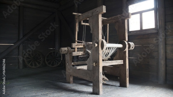 Obraz Old age wooden loom machine - manually operated mill machinery