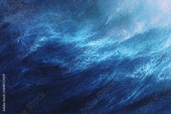 Fototapeta Abstract representation of turbulent ocean waves in deep blue hues with shimmering highlights