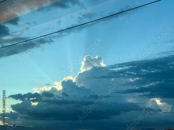 Obraz 夕暮れの積乱雲と新幹線の車窓からの風景