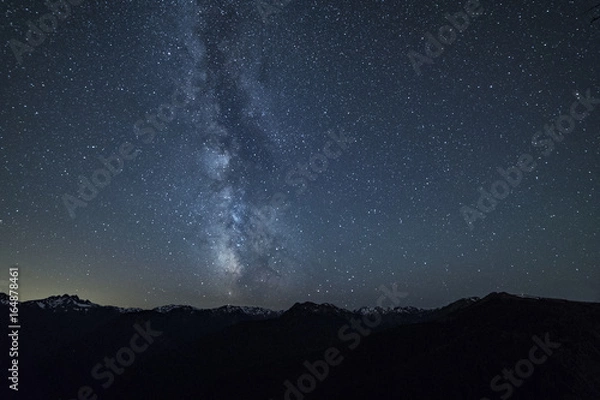 Obraz milky way over a big mountain range
