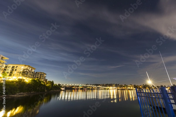 Obraz reflections in a harbor at night