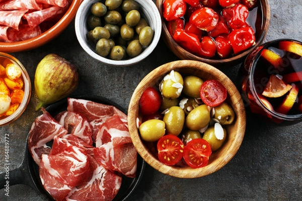 Obraz spanish tapas and sangria on wooden table - mediterran antipasti set