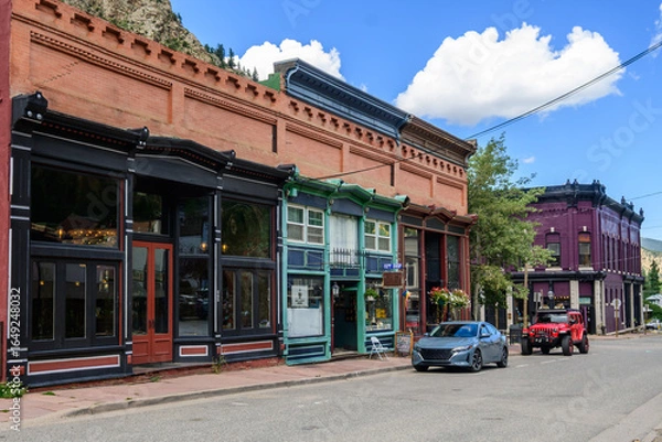 Obraz Street of preserved late 1800s architecture buildings with brick facades and painted wood trim. A glimpse into the past during its mining boom days.