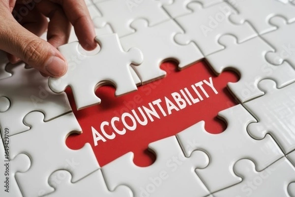 Fototapeta Hand Placing a Puzzle Piece, business accountability and teamwork, problem solving.