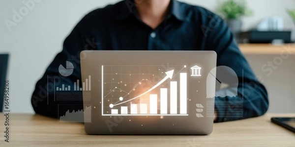Fototapeta Man Working on a Laptop with a Graph, financial business growth and strategy, future success.