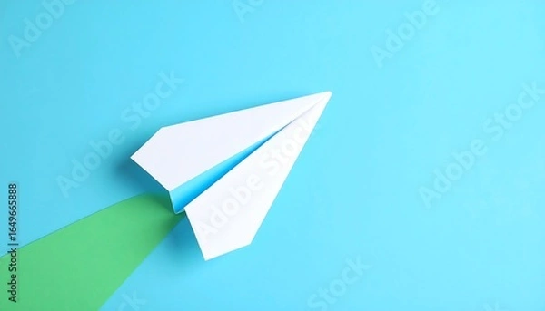 Fototapeta Colorful paper airplane on a vibrant background.