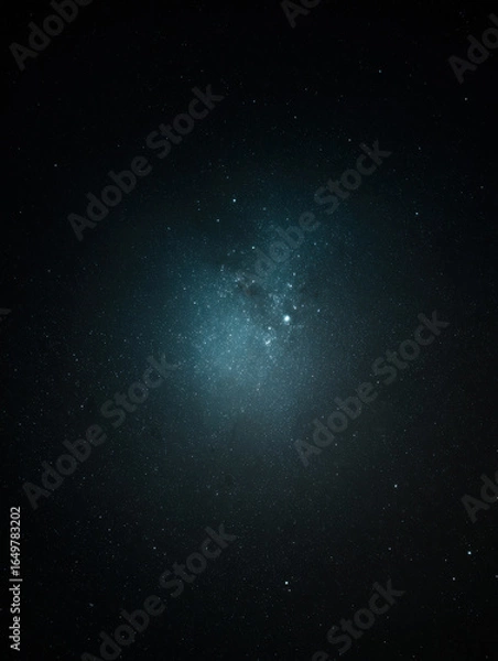Fototapeta A radial composition of an outer space. Cosmic scene filled with stars and distant galaxies. Soft cyan hues blending into the deep blackness of space.
