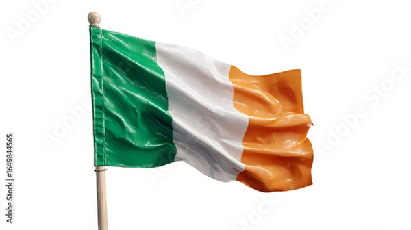 Fototapeta A waving flag of ireland with green white and orange colors on a pole against black background