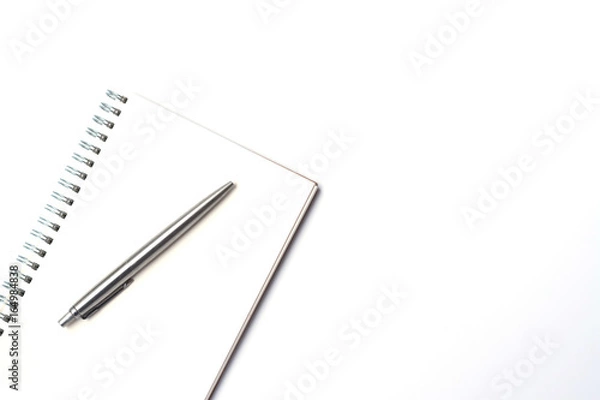Fototapeta Top view of modern white office desk table with white notebook and pen with copy space, flat lay.