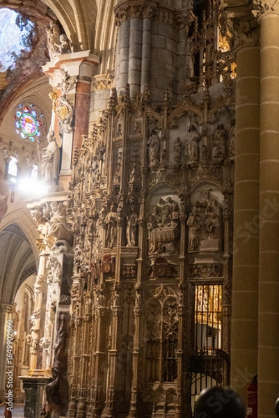 Fototapeta Intricate Architectural Detail Inside the Cathedral:  A mesmerizing view of the detailed interior of an age-old cathedral reveals the unique patterns, textures, and spiritual architecture.